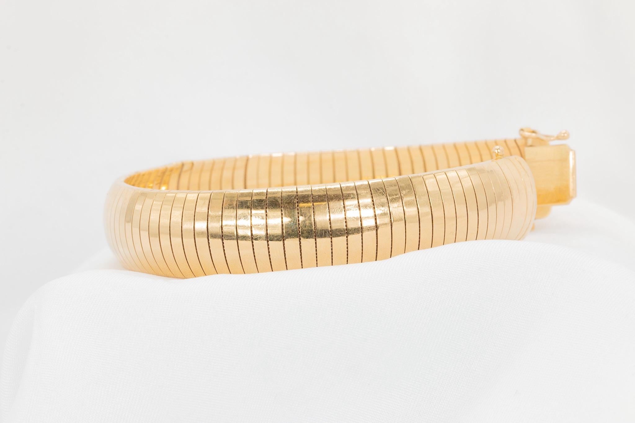 Vintage 14k Yellow Gold 13.8mm Omega Flex Bangle Bracelet In Good Condition In Houston, TX