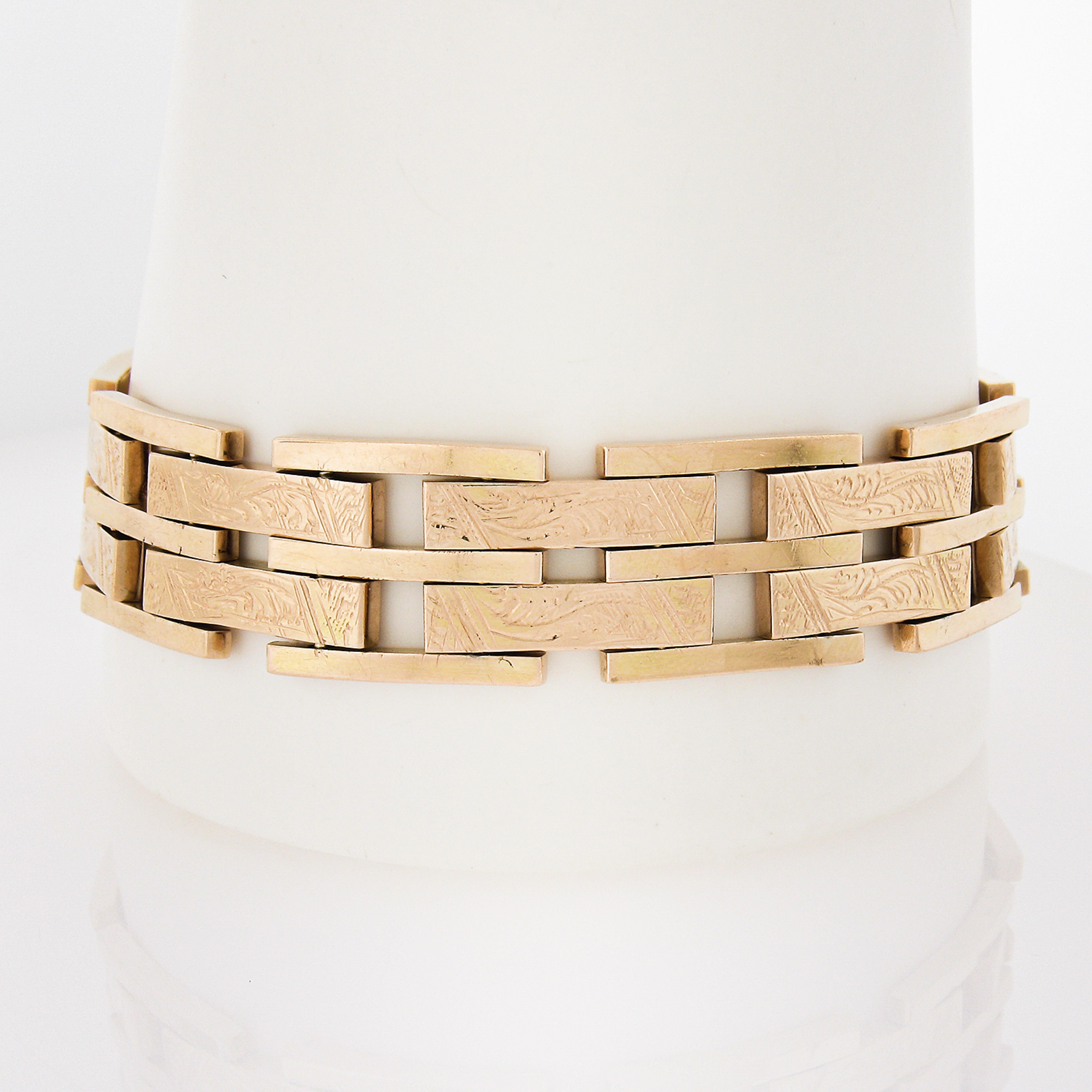 Material: Solid 14k Yellow Gold
Weight: 63.91 Grams
Type: Polished & Engraved Center Gate Link 
Length: Measures 8 Inches Next to a Ruler. Will comfortably fit up to a 7.5 inch wrist (fitted on a wrist)
Clasp: Dual Hook w/ Dual Fold Over