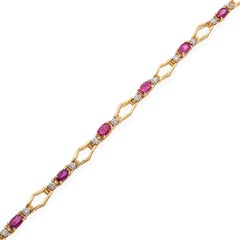 Vintage 14k Yellow Gold 2.25tcw Ruby and 0.1tcw Diamond Tennis Bracelet