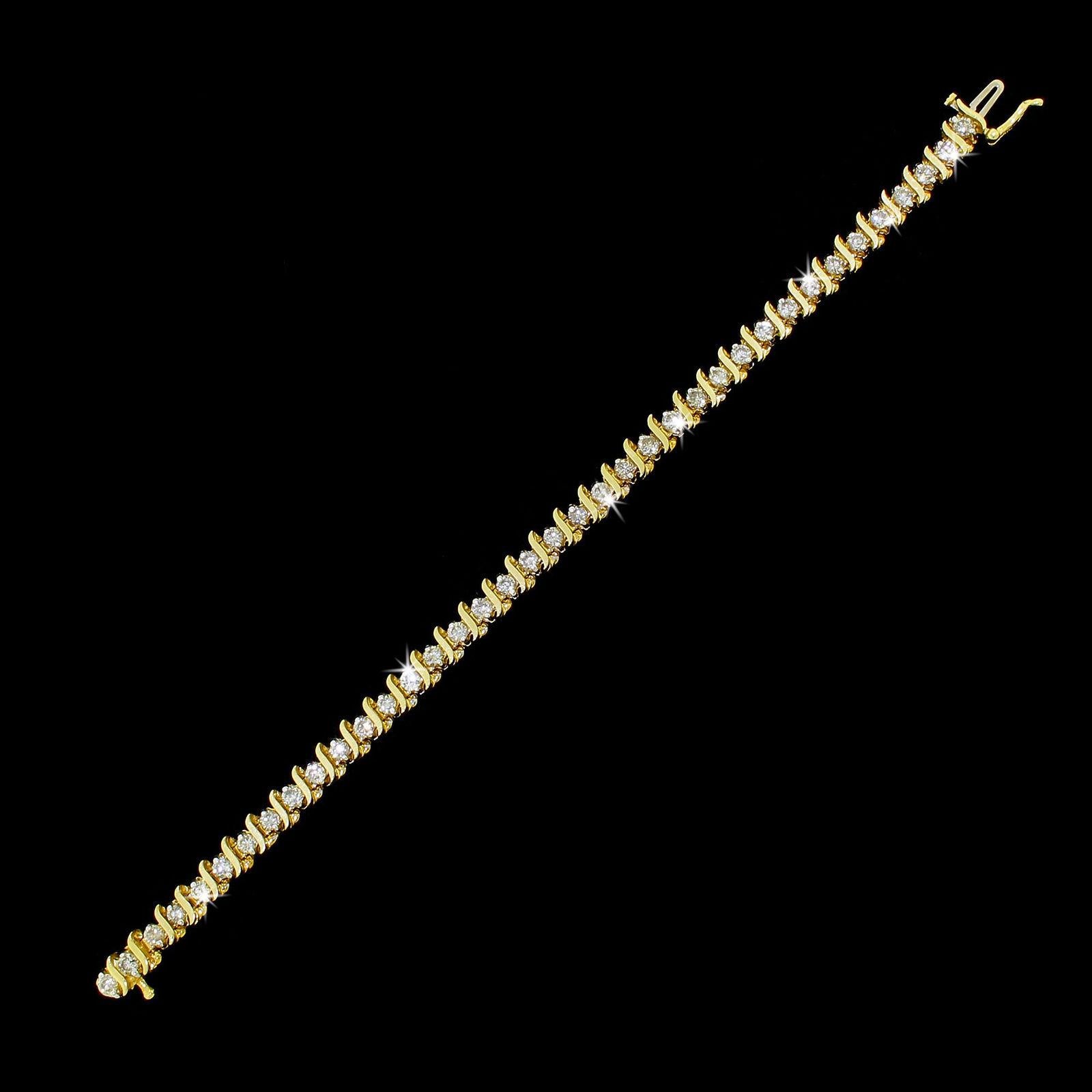 Details & Condition: Beautiful well made 14k gold tennis bracelet, perfect for every occasion or an every day wear, it is very versatile.
38 sparkling diamonds are nested in between shiny decorative 