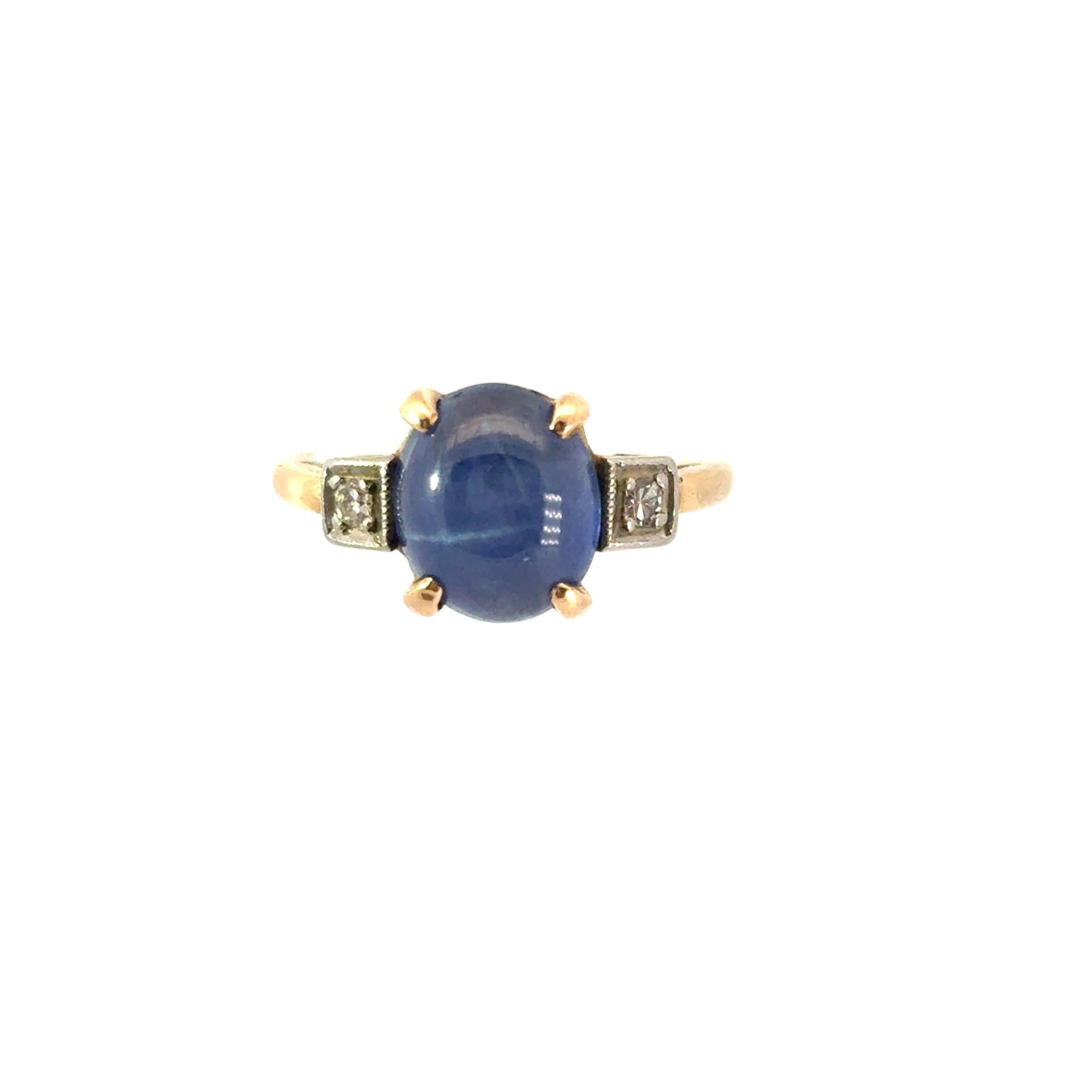 Vintage 14k Yellow Gold 3 Stone Ring set with Blue Sapphire and Diamond Side Stones

This stunning 3 Stone Gold Ring is in excellent condition and is ready to ship!

Design: 3 Stone Ring
Material: 14k Yellow Gold
Gemstone Details: This ring features