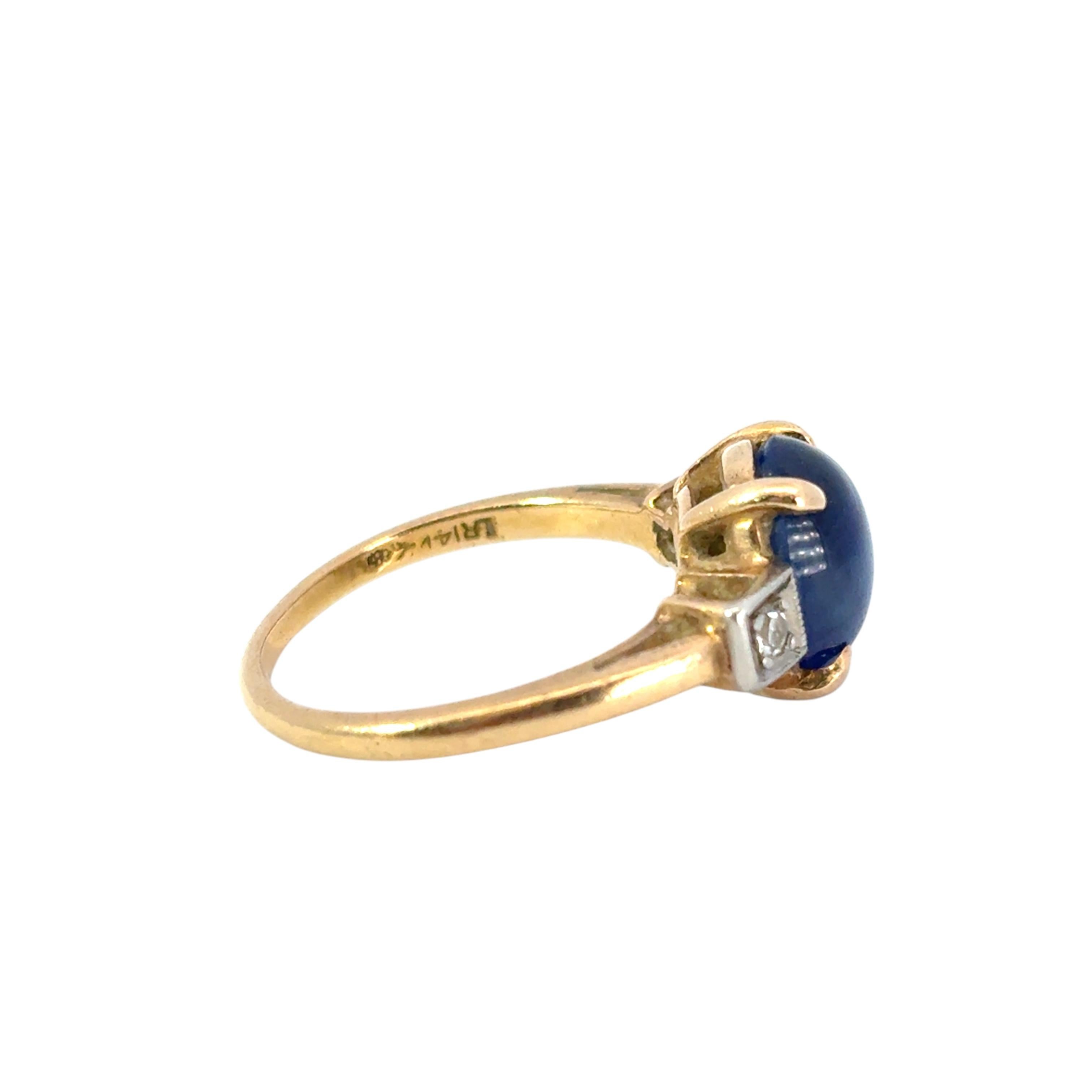 Vintage 14k Yellow Gold 3 Stone Ring with Blue Sapphire and Diamond Side Stones In Excellent Condition In Boca Raton, FL