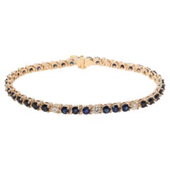 Vintage 14k Yellow Gold 3.96tcw Teal Sapphire and Diamond Tennis Bracelet