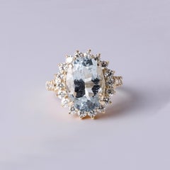 Vintage 14K Yellow Gold 5.27 Carat Oval Aquamarine & Diamond Halo Ring