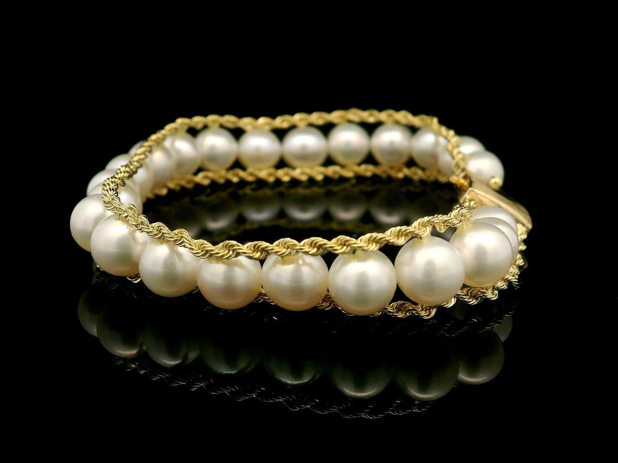 Vintage 14k Yellow Gold 7.2mm Pearl Line with Rope Chain Borders Bracelet In Excellent Condition In Montclair, NJ