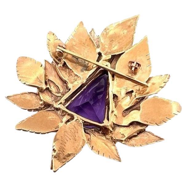 Vintage 14K Yellow Gold Leaf Brooch with Natural Amethyst – 13.04g – Approx. 9.00 Carats – Hand Engraved 1983

🡆 Description:
Offered is a beautifully designed vintage brooch crafted in solid 14K yellow gold and centered with a striking natural