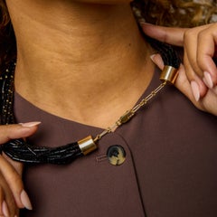 Vintage 14k yellow gold 9-strand onyx bead necklace