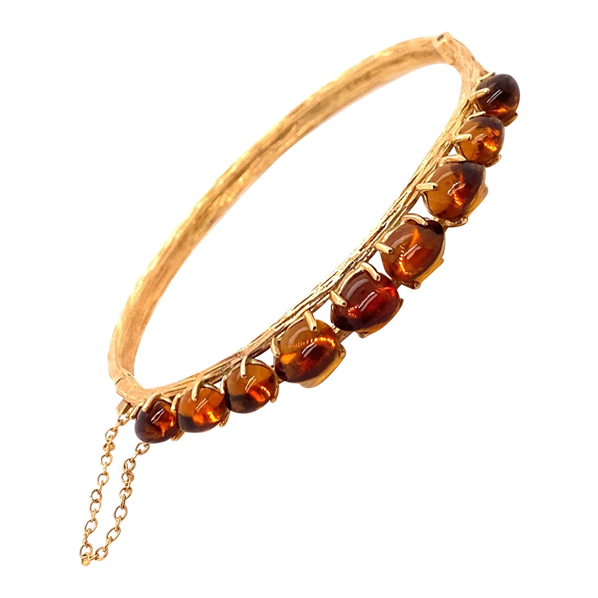 Bracelet jonc vintage en or jaune 14 carats et ambre en vente