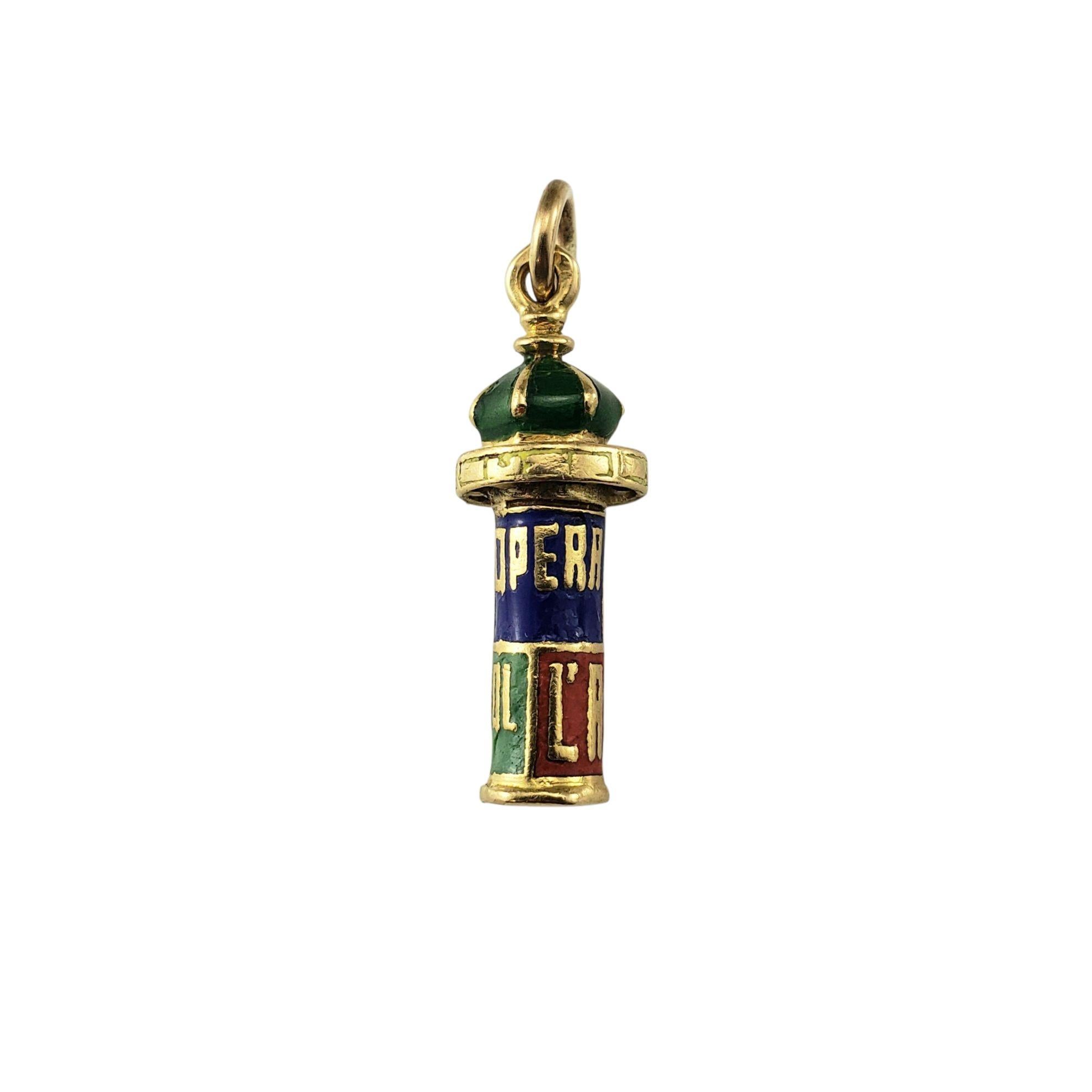 14 Karat Yellow Gold and Enamel Paris Kiosk Charm

A rare and delightful collectible, this miniature Parisian kiosk charm is crafted in 18K yellow gold and decorated with bright enamel panels advertising for local plays, operas, and films.
A