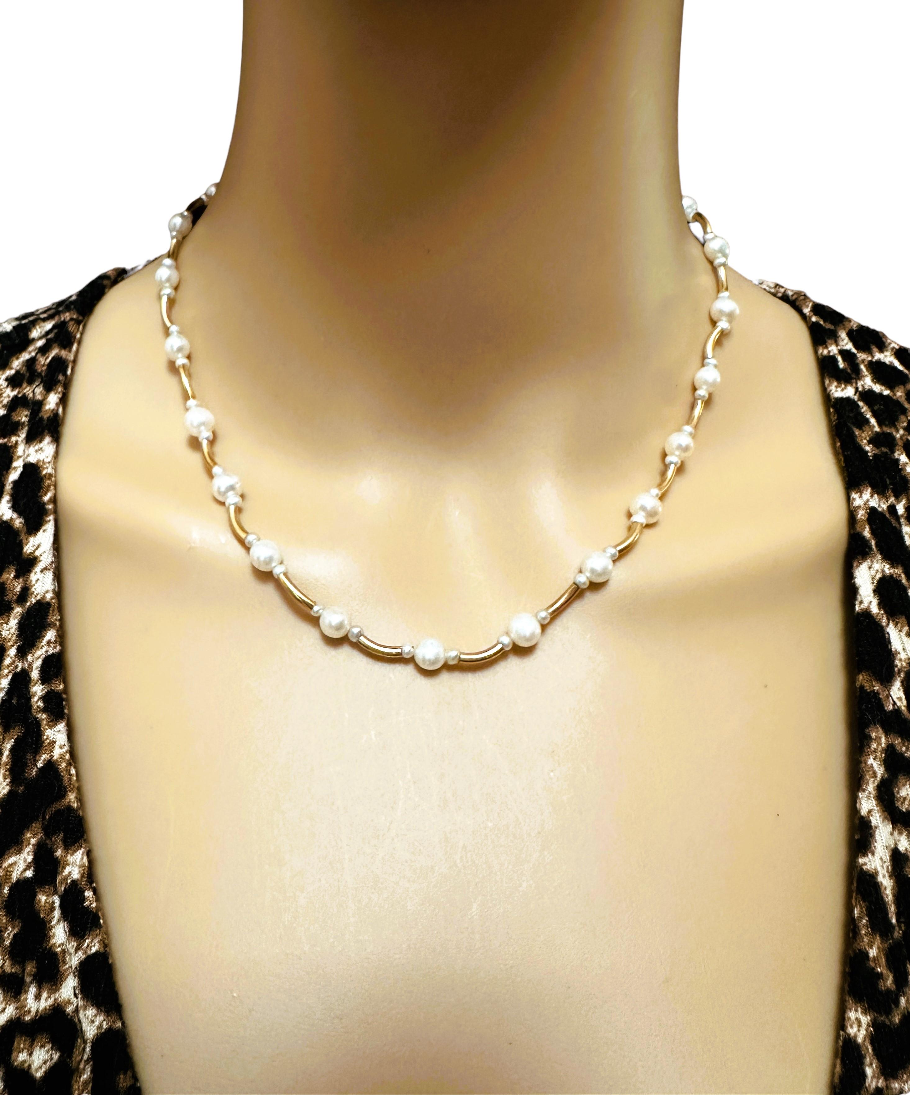 What a beautiful elegant necklace.  You can dress it up or down.  It has 14k Gold curved spacers in between the pearls which makes this necklace special.  Each 5.5m is flanked by a smaller pearl measuring 3 mm.  It has a 3 inch extender and can go