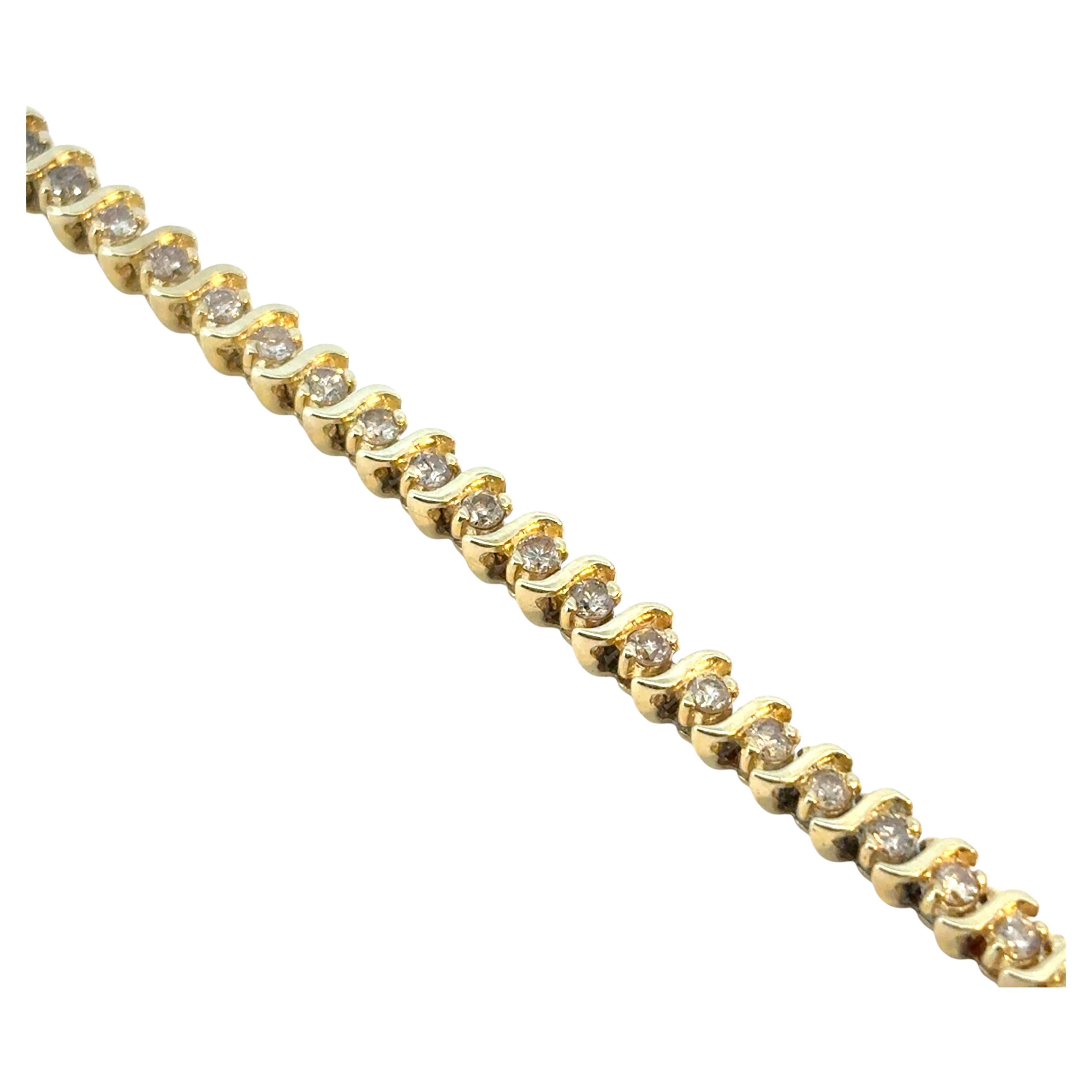 Tennisarmband aus 14 Karat Gelbgold mit ca. 2,94 Karat Diamanten