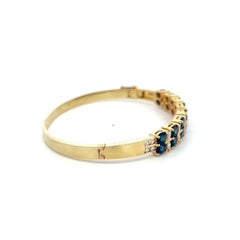 Vintage 14K Yellow Gold Bangle Bracelet with 1 Carat Diamond 6.64 Carat Sapphire