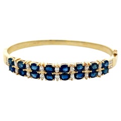 Vintage 14K Yellow Gold Bangle Bracelet with 1 Carat Diamond 6.64 Carat Sapphire