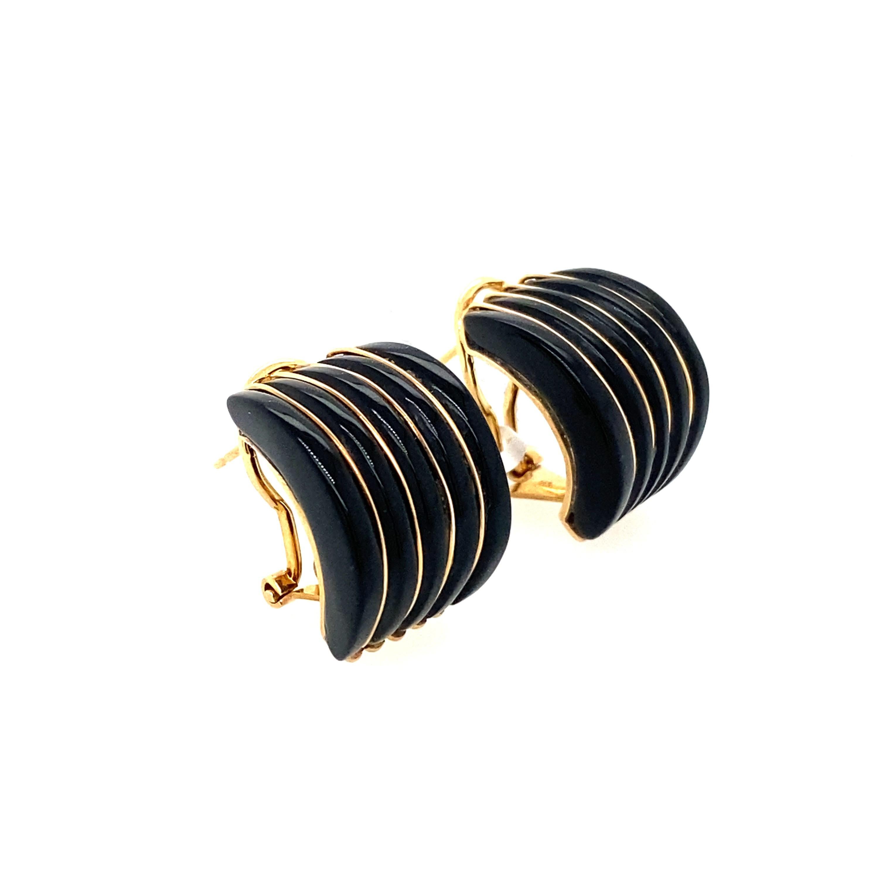 Vintage 14 karat yellow gold huggie hoop earring with black onyx.