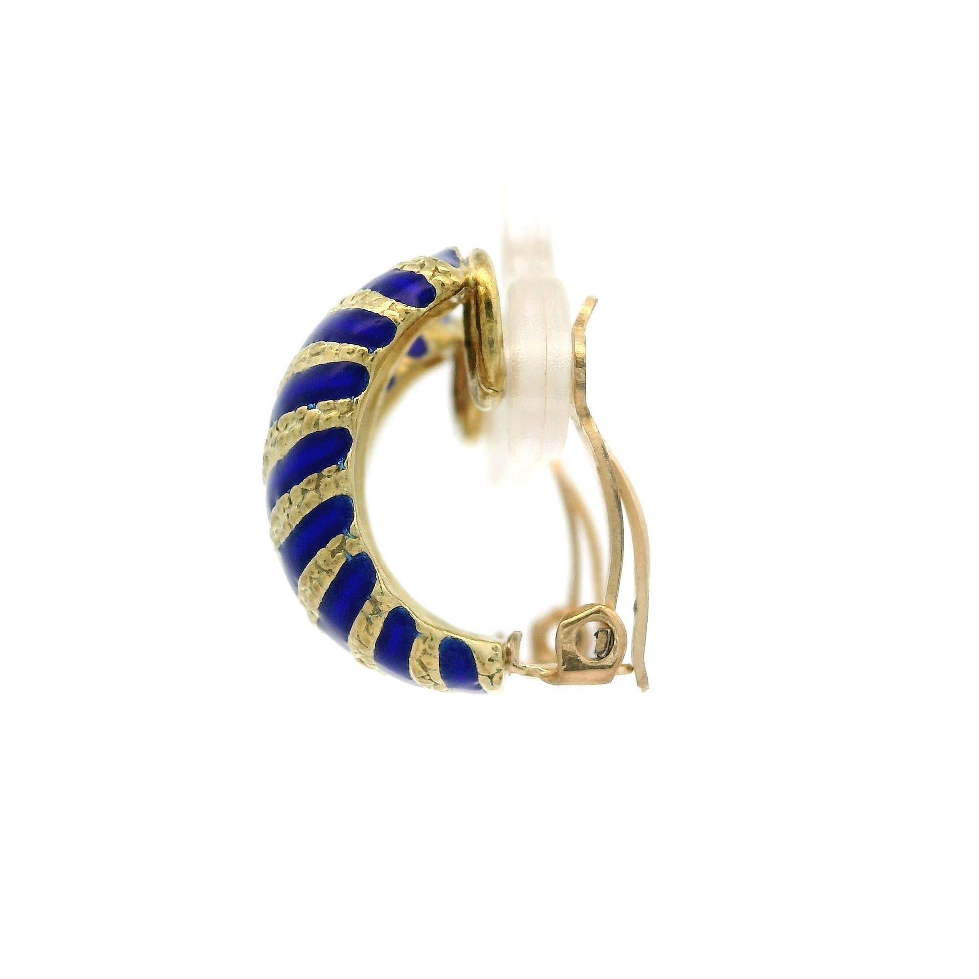Material: Solid 14k Yellow Gold w/ Blue Enamel Work
Weight: 8.94 Grams
Backing: Posts w/ Clip On Closures (pierced ears are Not required. Posts can be added upon request.)
Width: 10.5mm (0.41