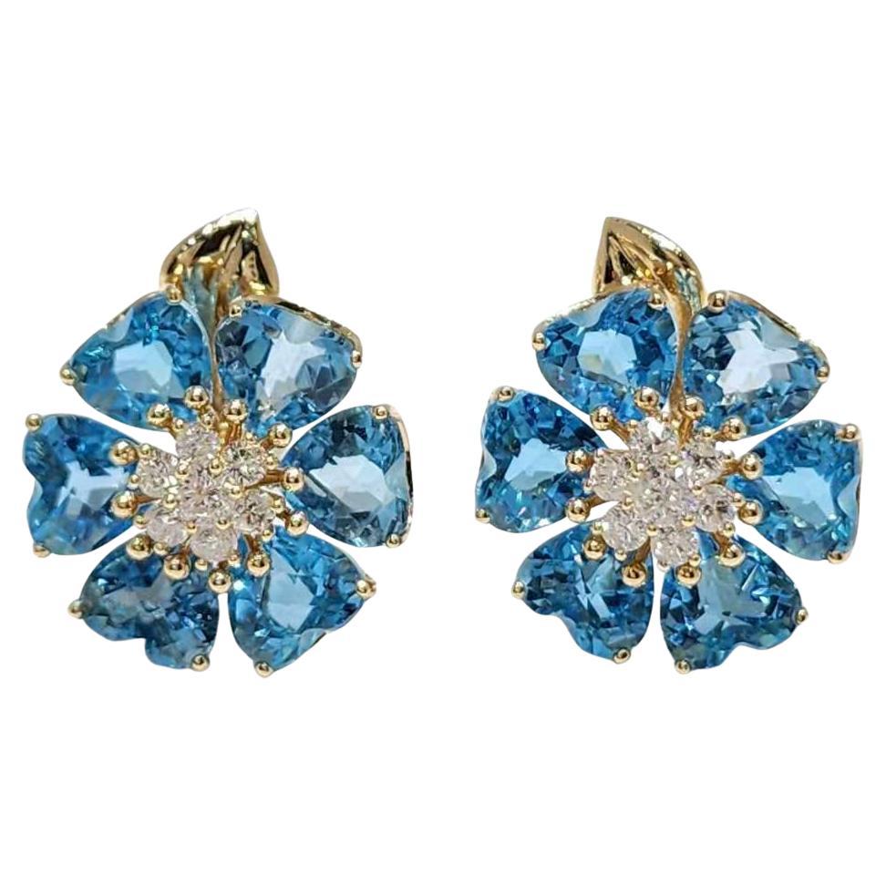 Orecchini d'epoca in oro giallo 14K con fiori di topazio blu e diamanti
