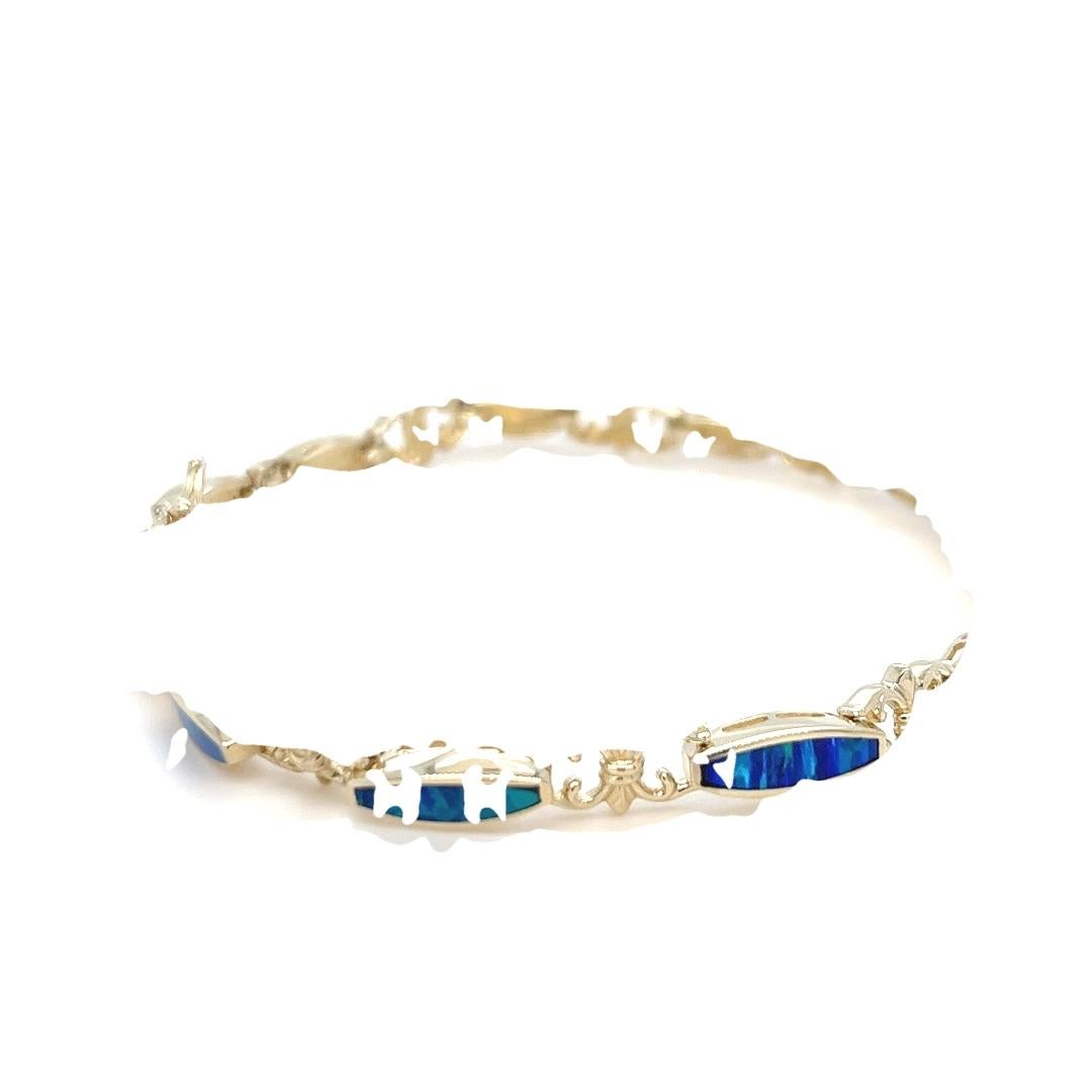 Femenino o masculino Pulsera vintage de oro amarillo de 14 quilates con incrustaciones de ópalo azul y verde en venta