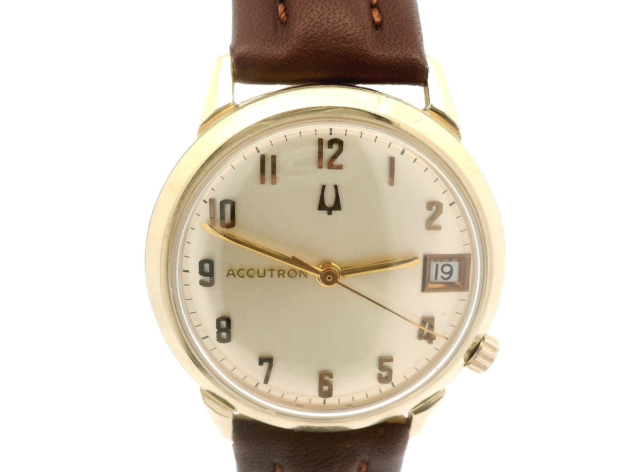 Watchmaker: Bulova
Reference No.: M9
Movement: Quartz - American Made
Case Dimensions: 34mm (width - not including crown) - 40mm (lug to lug)
Case Thickness: 10mm
Strap: Brown Genuine Leather w/ Gold Tone Buckle and Tang
Strap Length:	Adjustable -