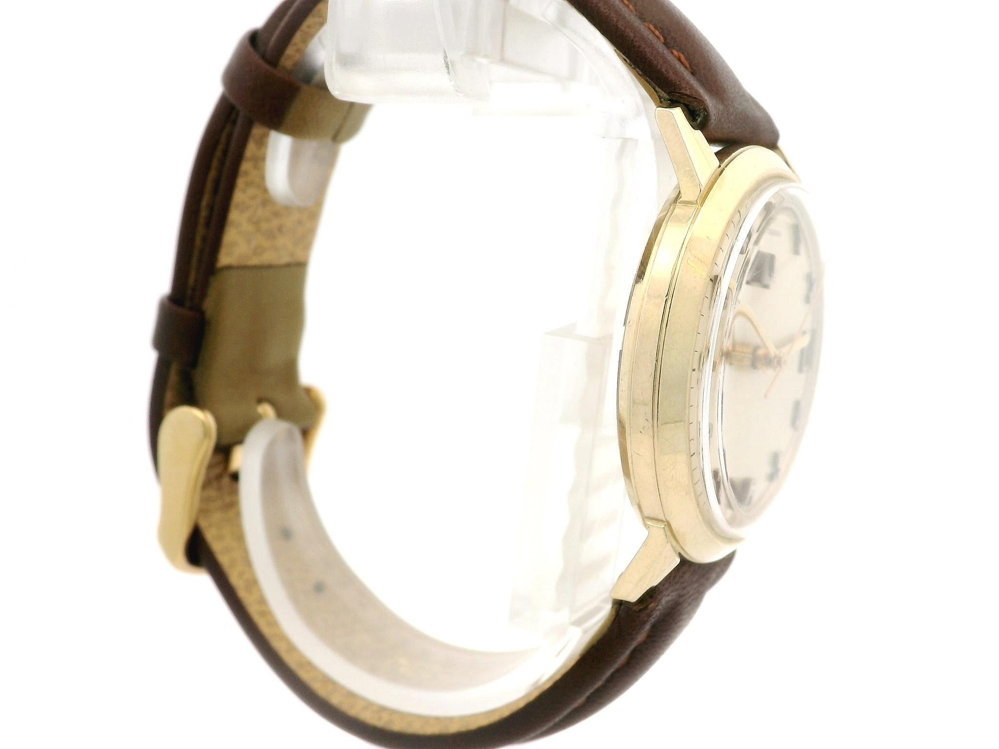 Vintage 14k Yellow Gold Bulova Accutron 34mm Date Quartz Wrist Watch Ref. M9 For Sale 2