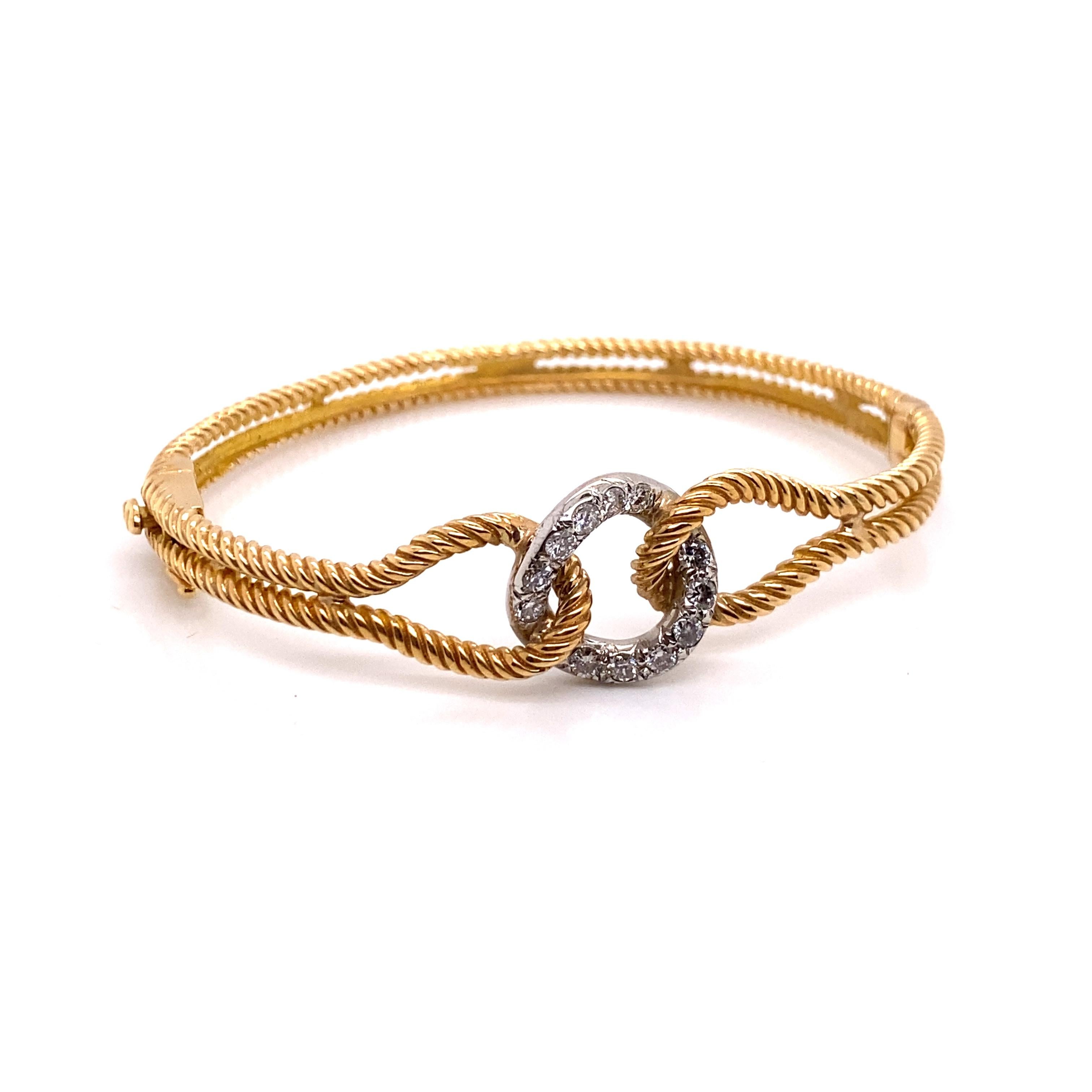 Vintage 14K Yellow Gold Cable Lasso Bangle with Diamond Center - The white gold center piece contains 12 round brilliant diamonds with a total approximate weight of .50ct with G - I color and SI clarity. The bangle measures 15.3mm on top and tapers