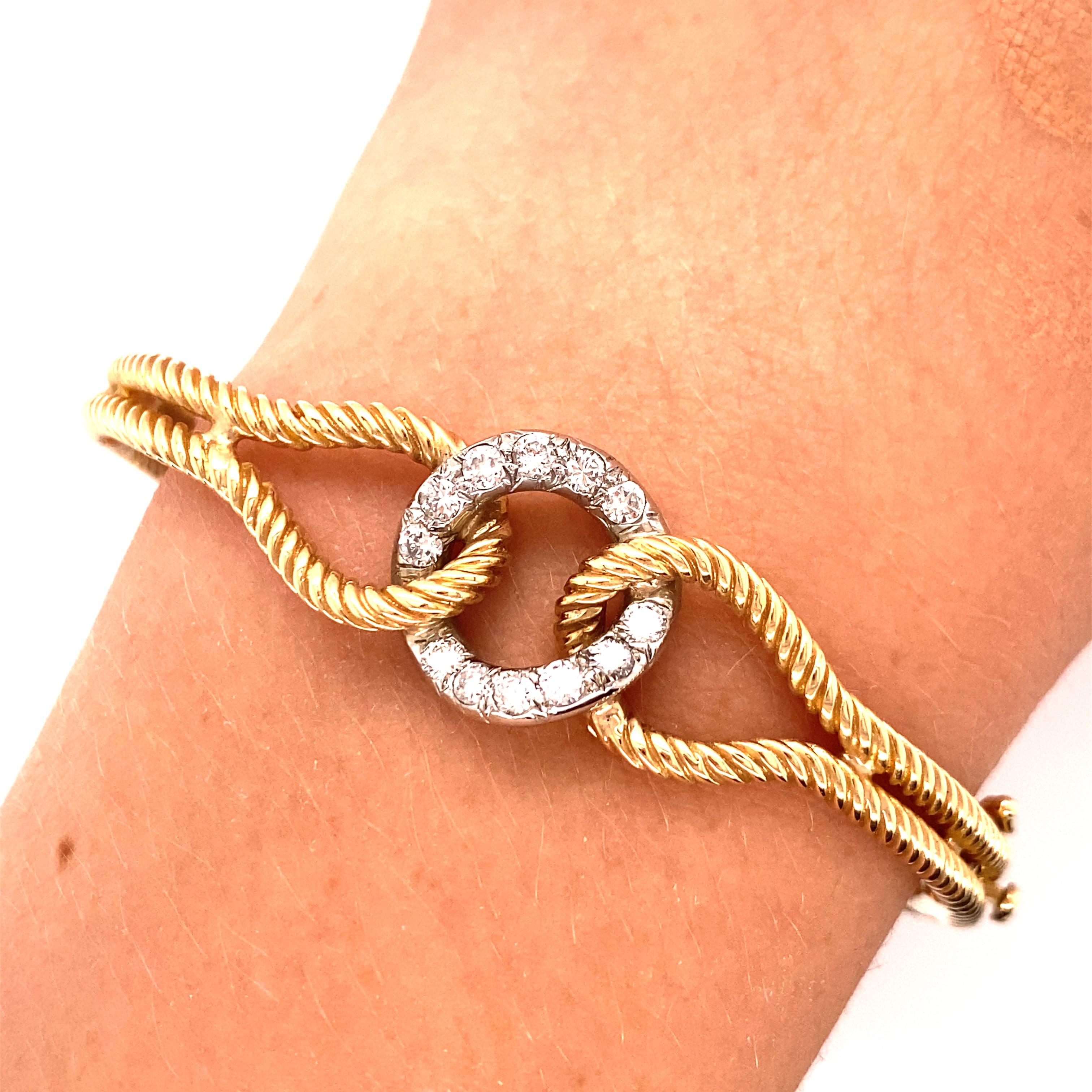 Contemporary Vintage 14K Yellow Gold Cable Lasso Bangle with Diamond Center For Sale