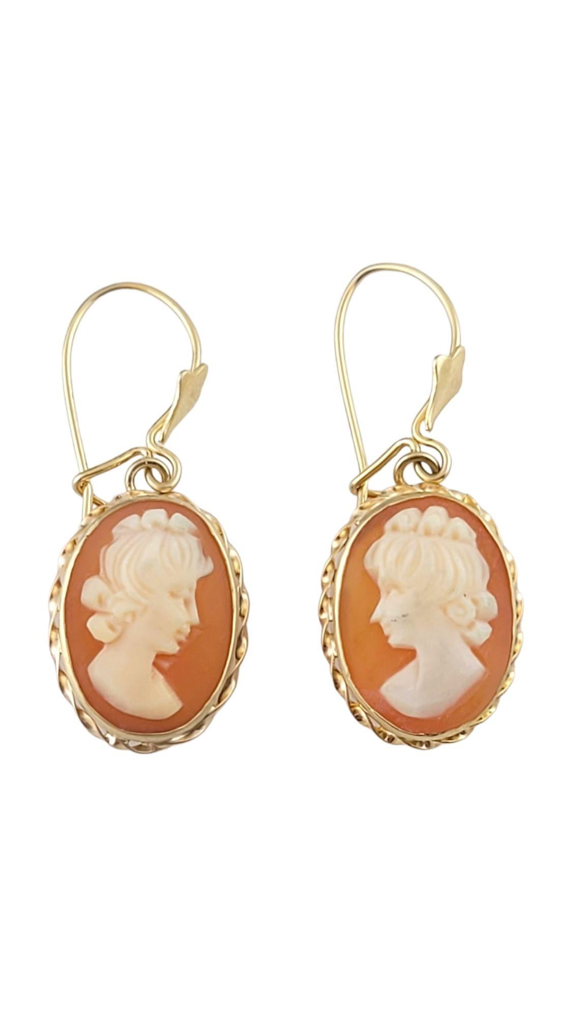 Gorgeous set of cameo dangle earrings set in 14K yellow gold!

Size: 30.2mm X 12mm X 4.8mm

Weight: 2.47 g/ 1.6 dwt

Hallmark: 14

Very good condition, professionally polished.

Will come packaged in a gift box or pouch (when possible) and will be
