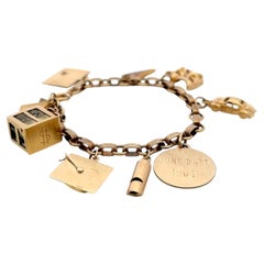 Vintage 14K Yellow Gold Charm Bracelet 7x0.85x0.41 Inch 24.6 Grams