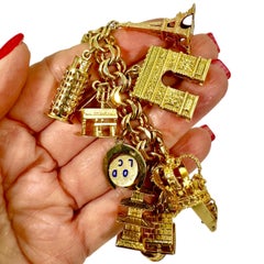 Vintage 14K Yellow Gold Charm Bracelet w/ 26 Dimensional Charms, Circa 1950-1965