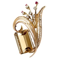 Broche de oro amarillo de 14 quilates con citrino, rubí y diamantes