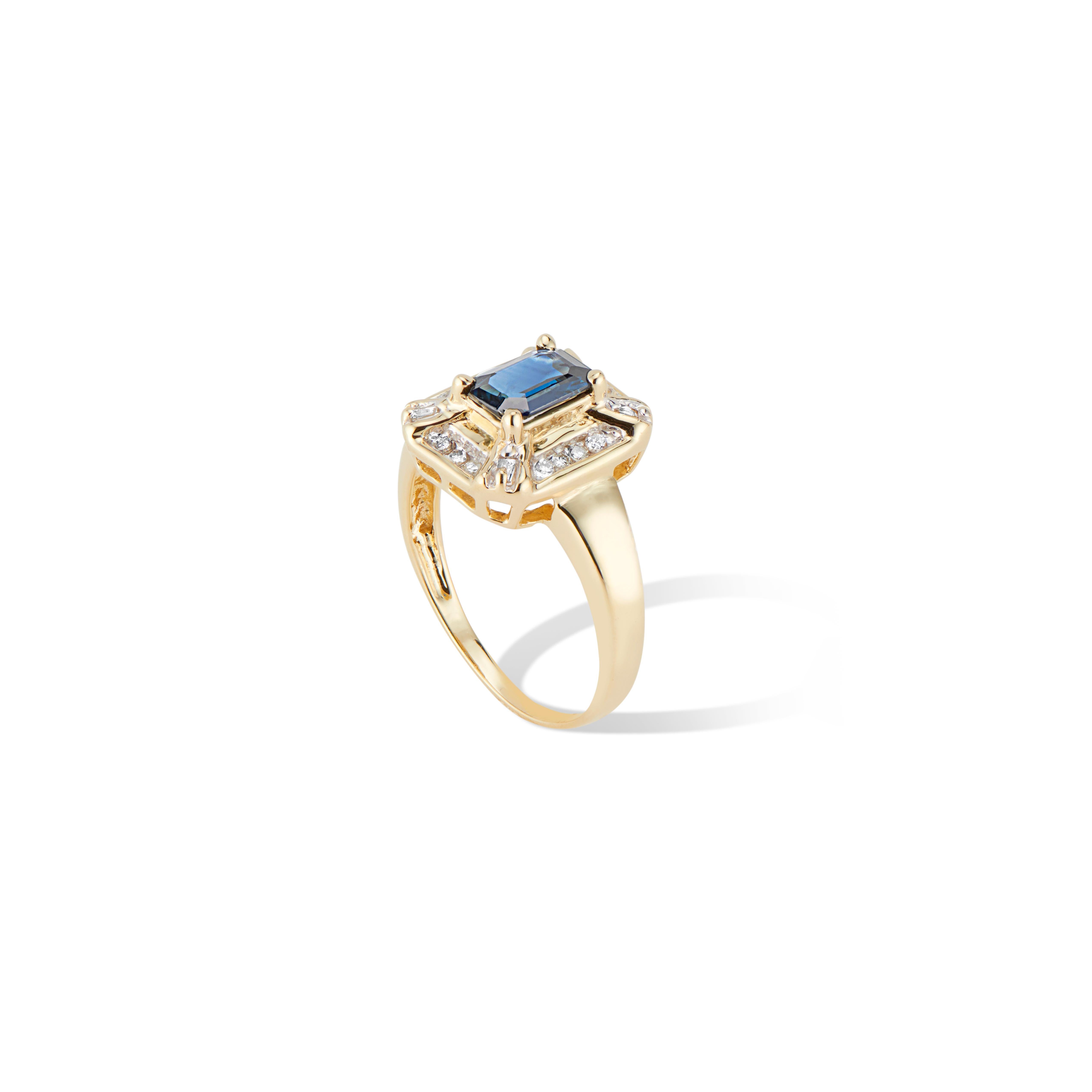 One of a kind Vintage ring from the 1970’s featuring the signature linear baguette, round diamonds and a raised Emerald cut sapphire center stone.
This was the disco era and yellow gold chunky designs were the style.
The intense blue of this 1ct