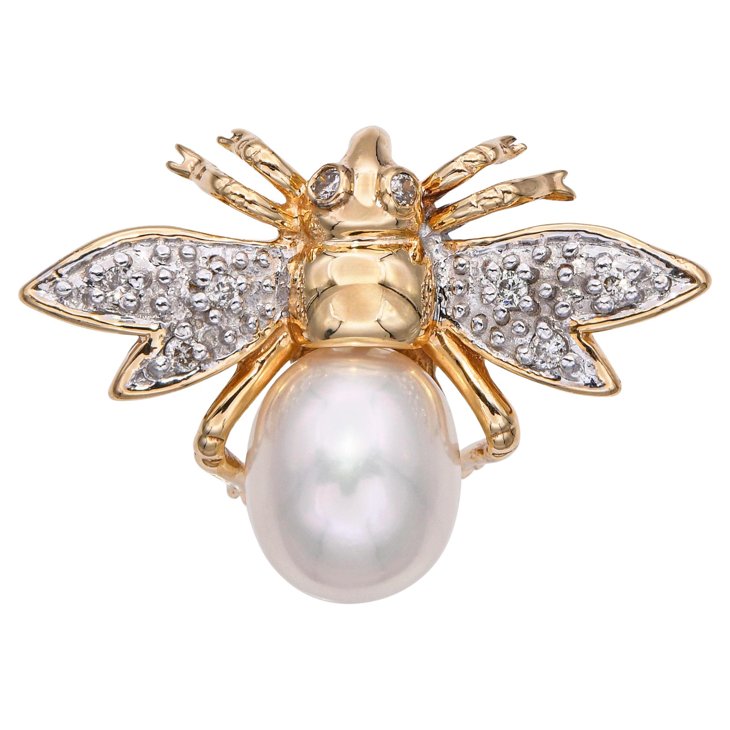 Spilla d
epoca in oro giallo 14k con diamanti e perle