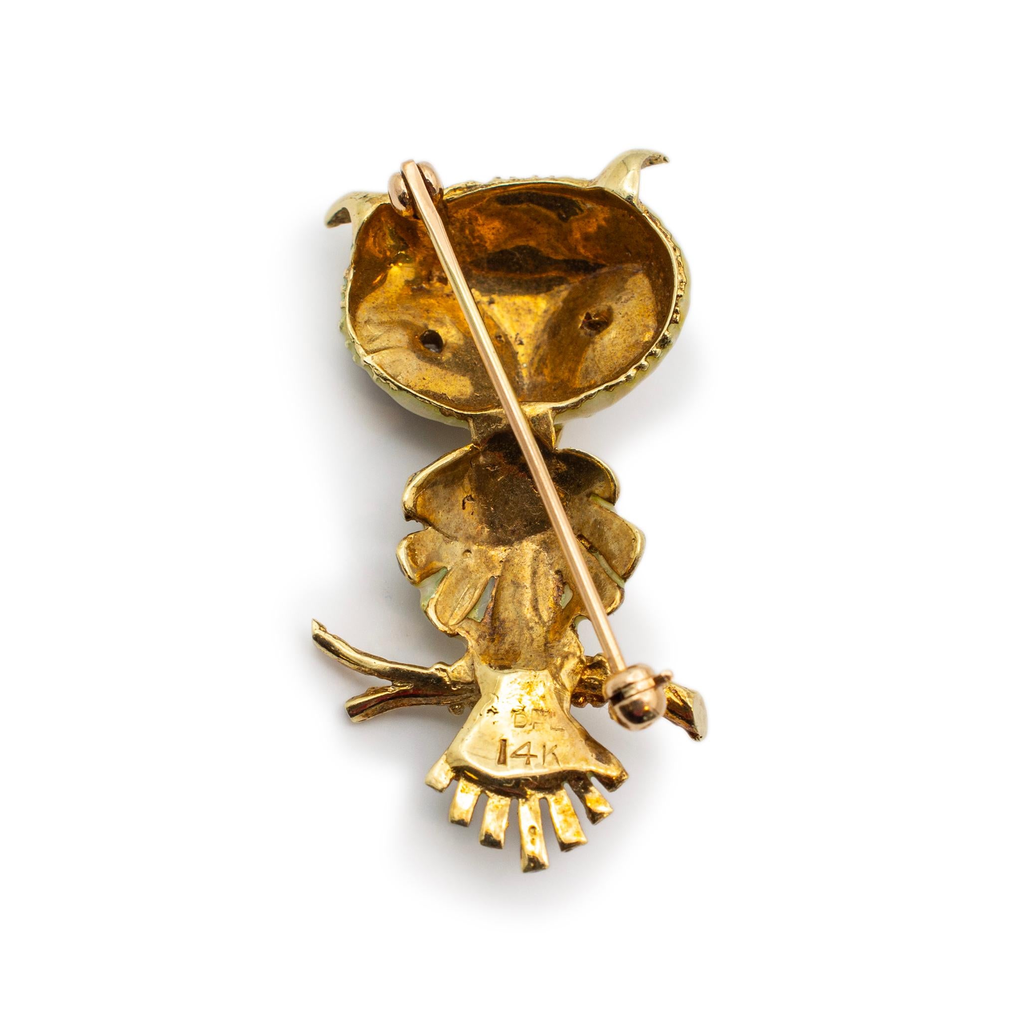 Metal Type: 14K Yellow Gold 

Length: 1.50 inches

Width: 18.60 mm

Weight: 7.48 grams

Ladies 14K yellow gold animal diamond mid-century brooch. Engraved with 