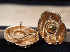 Ohrringe aus 14 Karat Gelbgold mit Diamanten und Fancy Wirbel