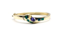 Vintage 14 Karat Yellow Gold Diamond, Opal and Tanzanite Hinged Bangle Bracelet
