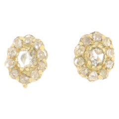 Orecchino vintage con diamante incastonato a griffe in oro giallo 14 carati, con chiusura a clip