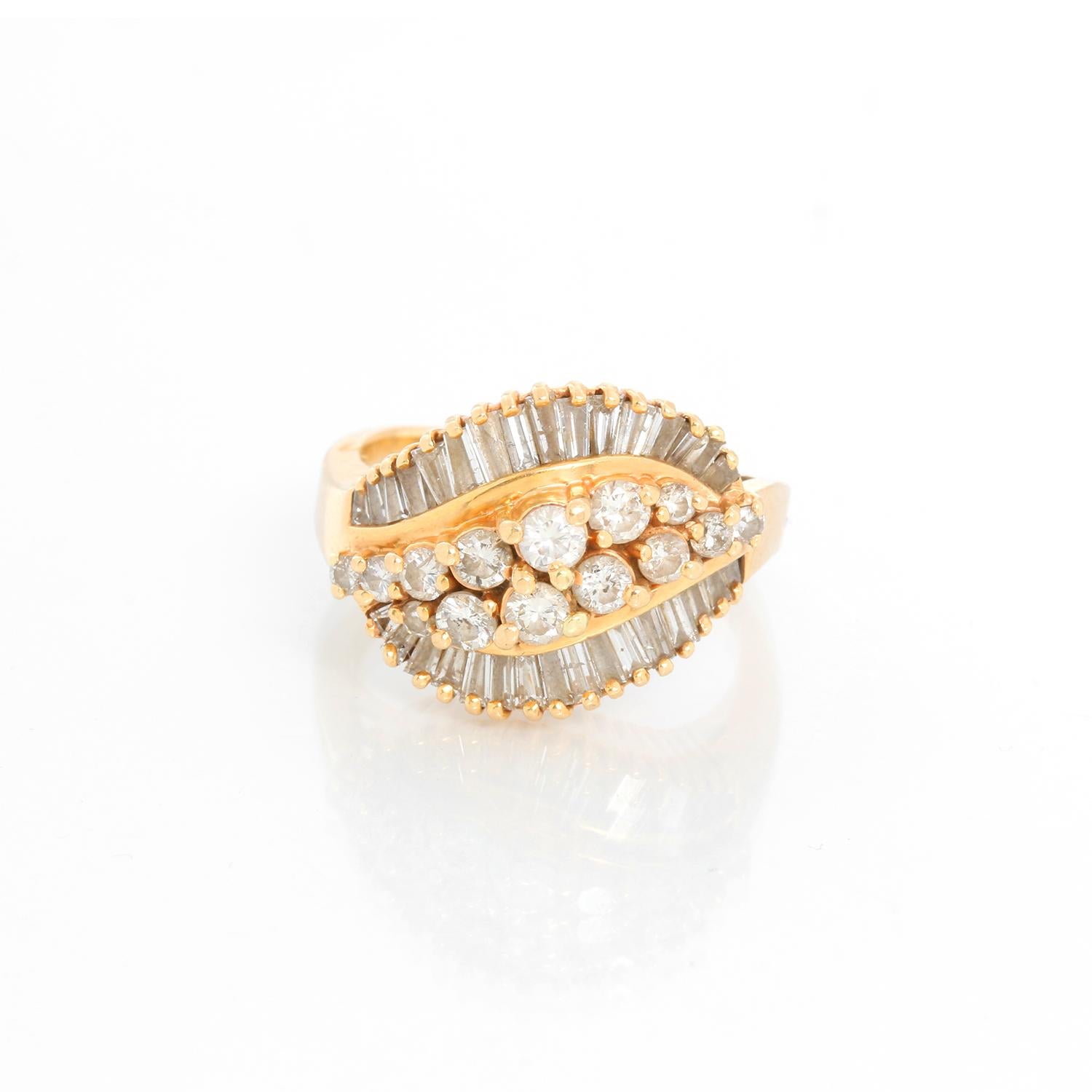 Vintage 14K Yellow Gold & Diamond Ring - Baguette cut diamonds and round brilliant diamonds set in 14 K Yellow gold. Weighing approx. 1.25 cts. Size 7 1/4. Pre-owned with custom box .