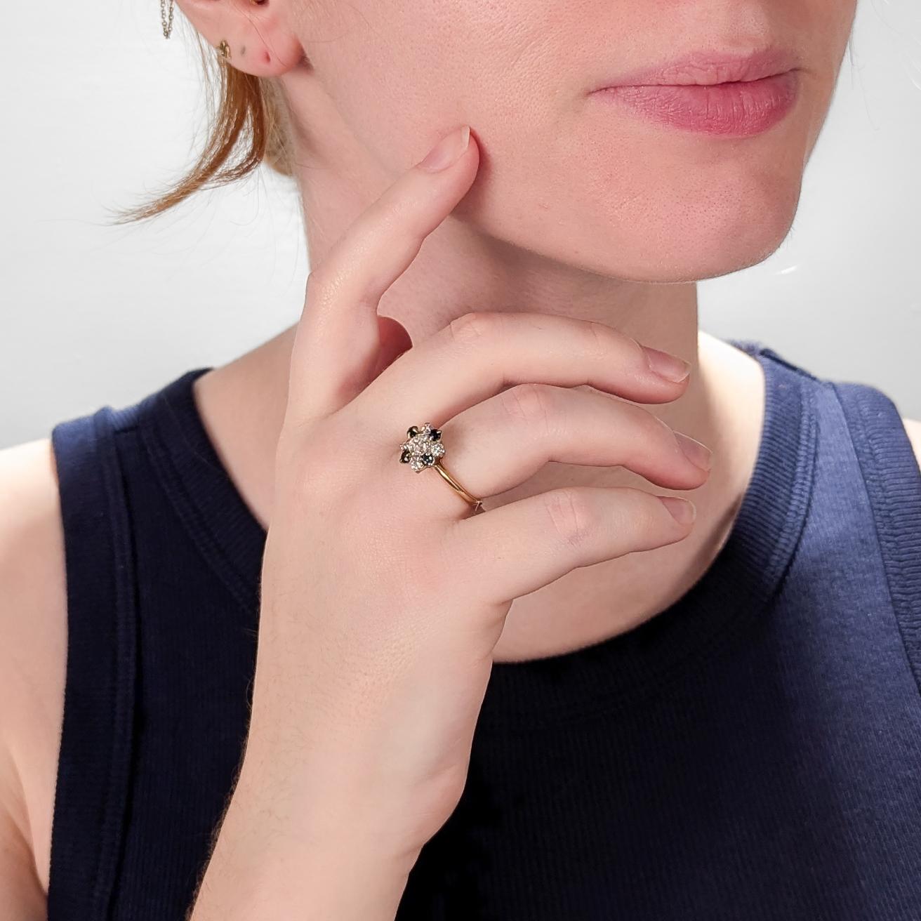 A fine gold, sapphire & natural diamond cocktail ring.

In 14 karat yellow gold.

Centered on a high set Old European cut ca. 0.51± ct. diamond surrounded by 8 alternating stones, 4 round mixed cut sapphires (0.36± Ctw, Color: Blue, Clarity: