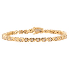 Bracciale tennis vintage con diamanti in oro giallo 14k