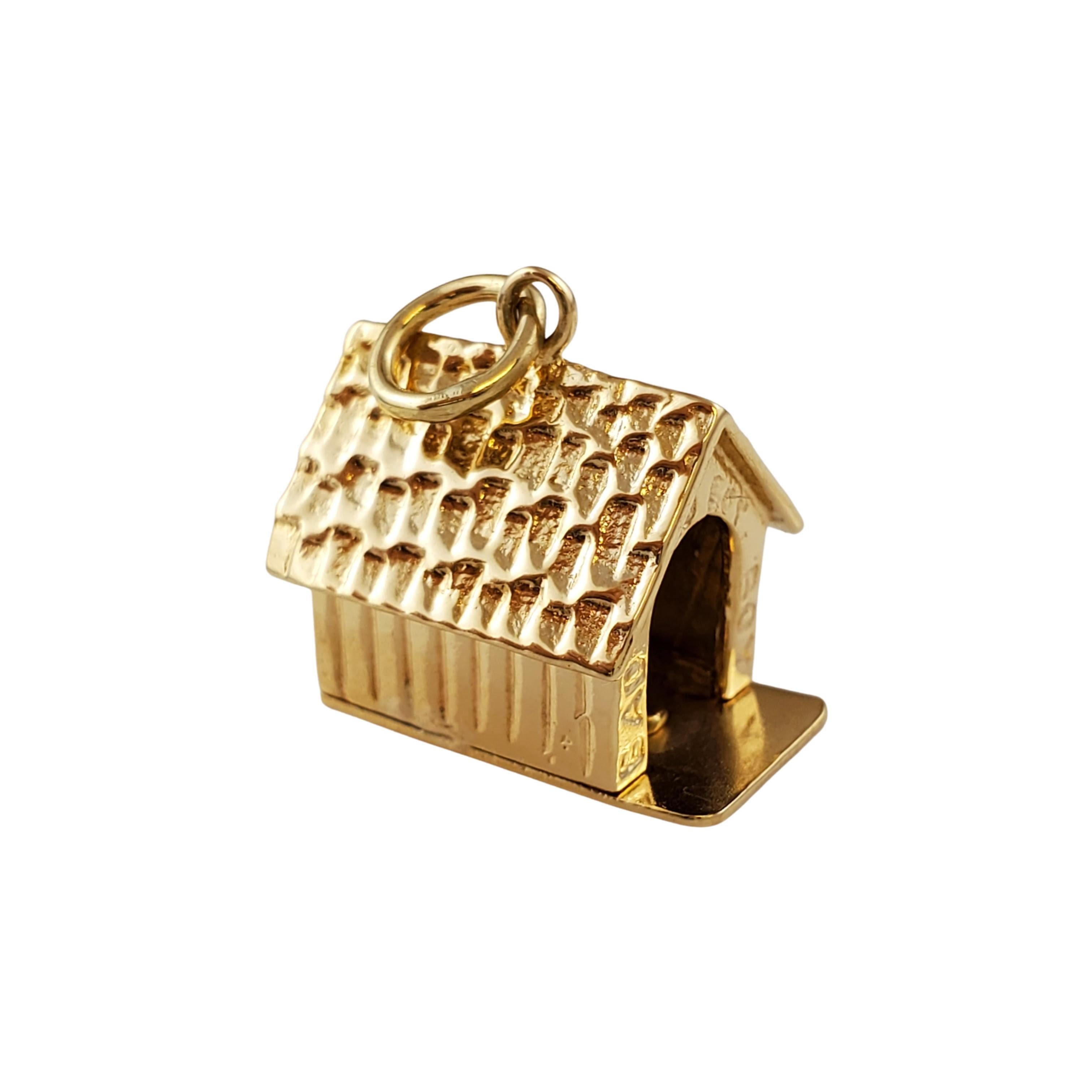 Vintage 14K Yellow Gold Dog in the Doghouse Charm

This 14k yellow gold charm is a doghouse with what appears to be a husband in the doghouse! Engraved around the door way of this doghouse states 