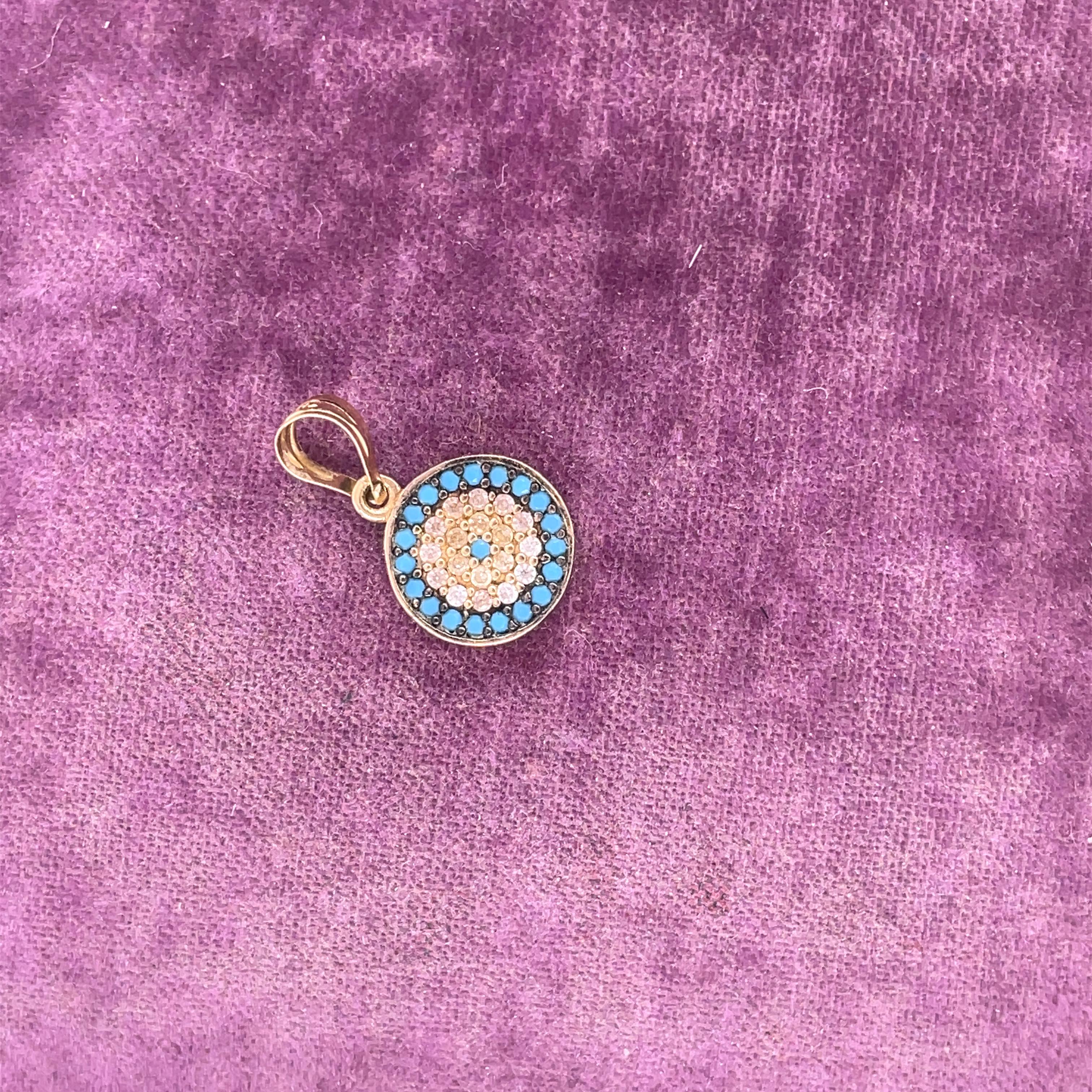 Title: Vintage 14K Yellow Gold Double Sided Pendant w/ Sapphires, Turquoise and Diamond

Year: 1980s

Item Details: 
Metal Type: 14k Yellow Gold [Hallmarked, and Tested]
Weight:  1.5 grams

Diamond Details:
Type: Natural
Weight: .25ct, total