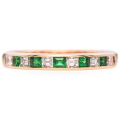 Bandring aus 14 Karat Gelbgold mit Smaragd und Diamant in Kanalfassung