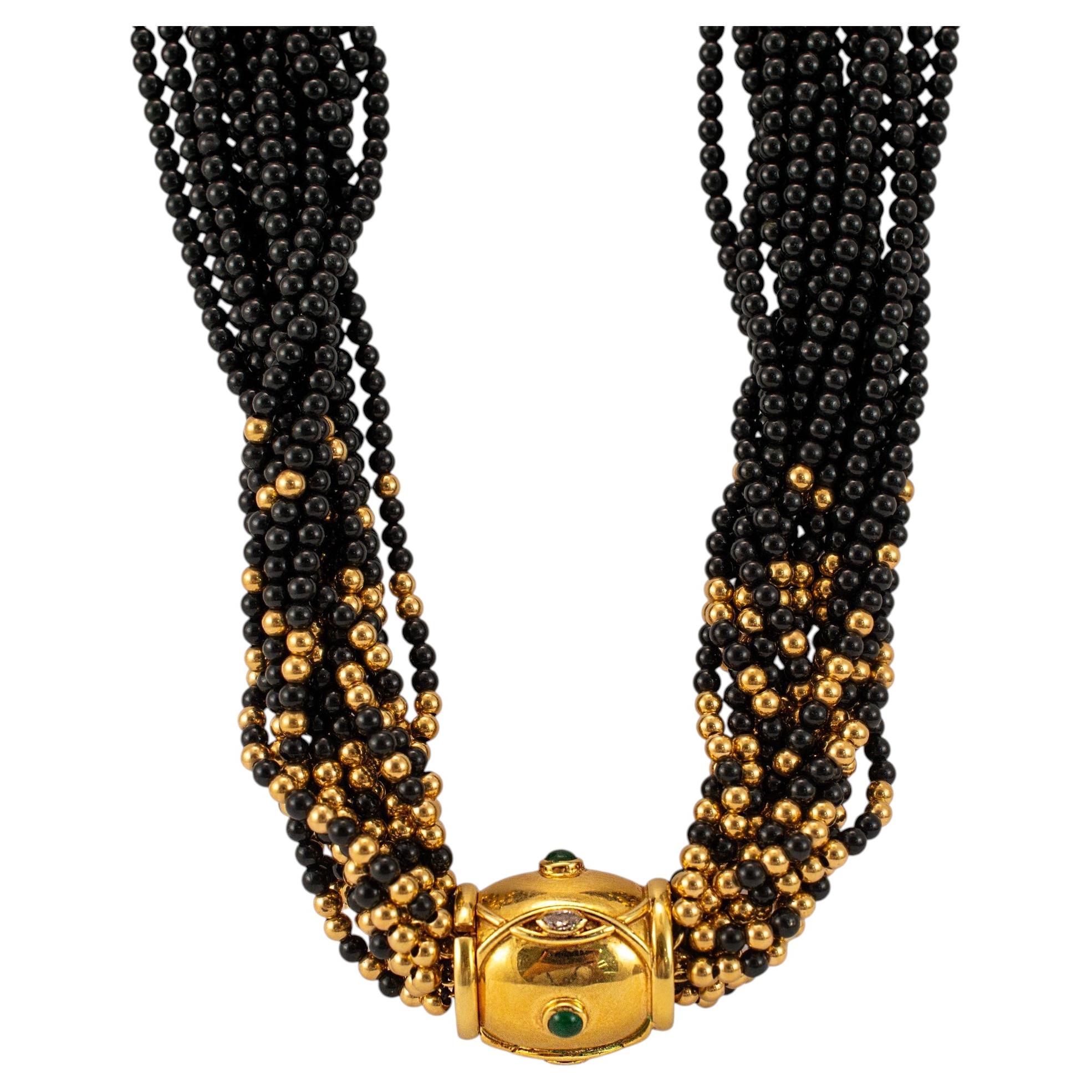 Collana vintage con ciondolo a più fili in oro giallo 14K con smeraldi, diamanti e perline di onice