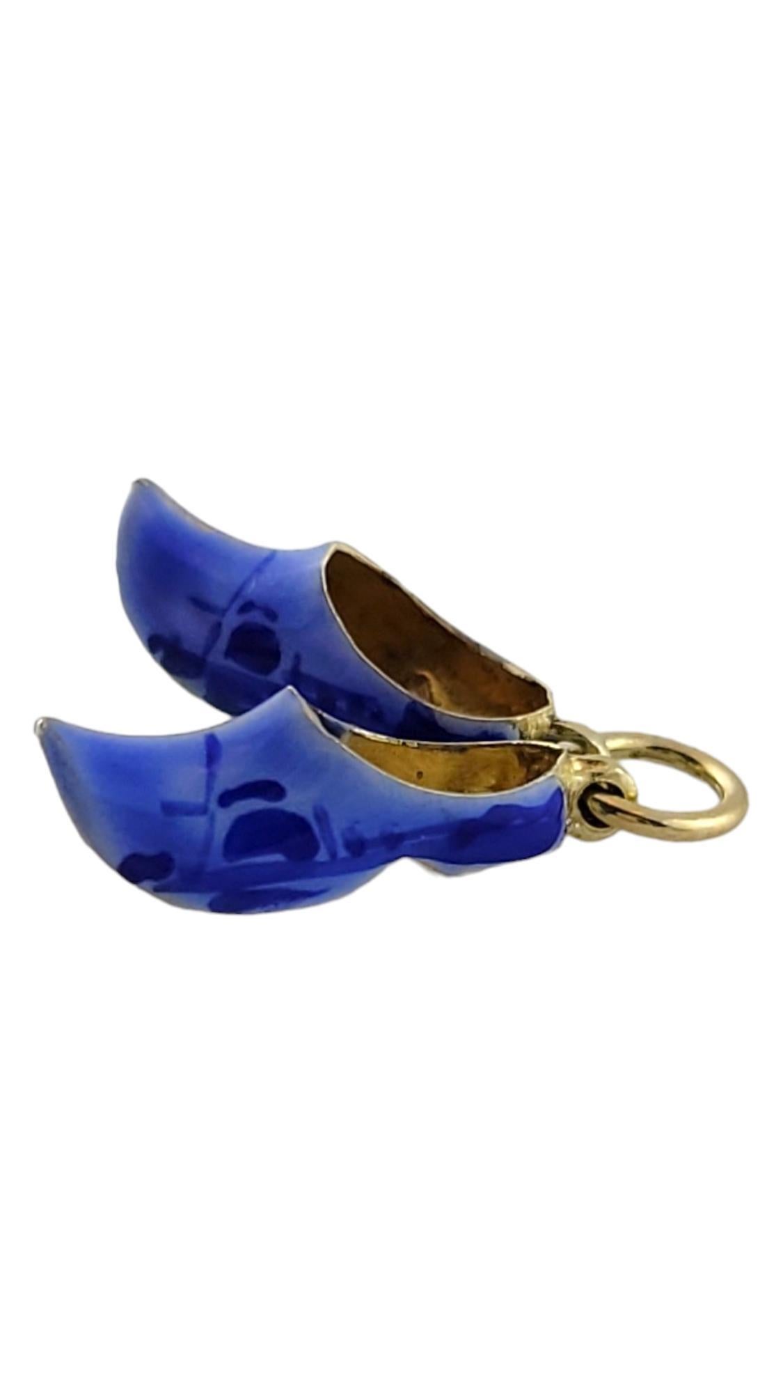 Vintage 14K Yellow Gold Enamel Dutch Clog Shoe Charm

This adorable Dutch clog charm is decorated with gorgeous blue enamel!

Size of each shoe: 12.88mm X 4.75mm X 5.14mm

Weight: 0.5 dwt/ 0.8 g

Hallmark: 585

Very good condition, professionally