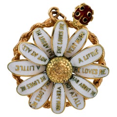 Vintage 14k yellow gold enamel "He loves me" daisy pendant