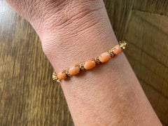Bracelet vintage en or jaune 14 carats, fleur sculptée et corail