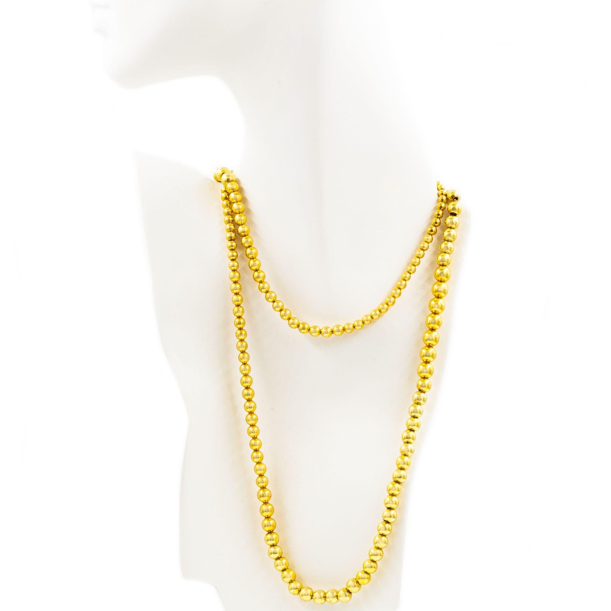 VINTAGE 14K GOLD GRADUATED BEAD NECKLACE
Item # C104271 

A super long and playful collection of graduated 14 karat yellow gold beads over an internal gold link chain. The length allows it to be worn either as a double-layered necklace or as one