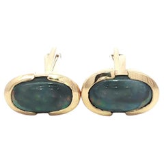 Gemelli vintage in oro giallo 14k con castone nero e opale di classe