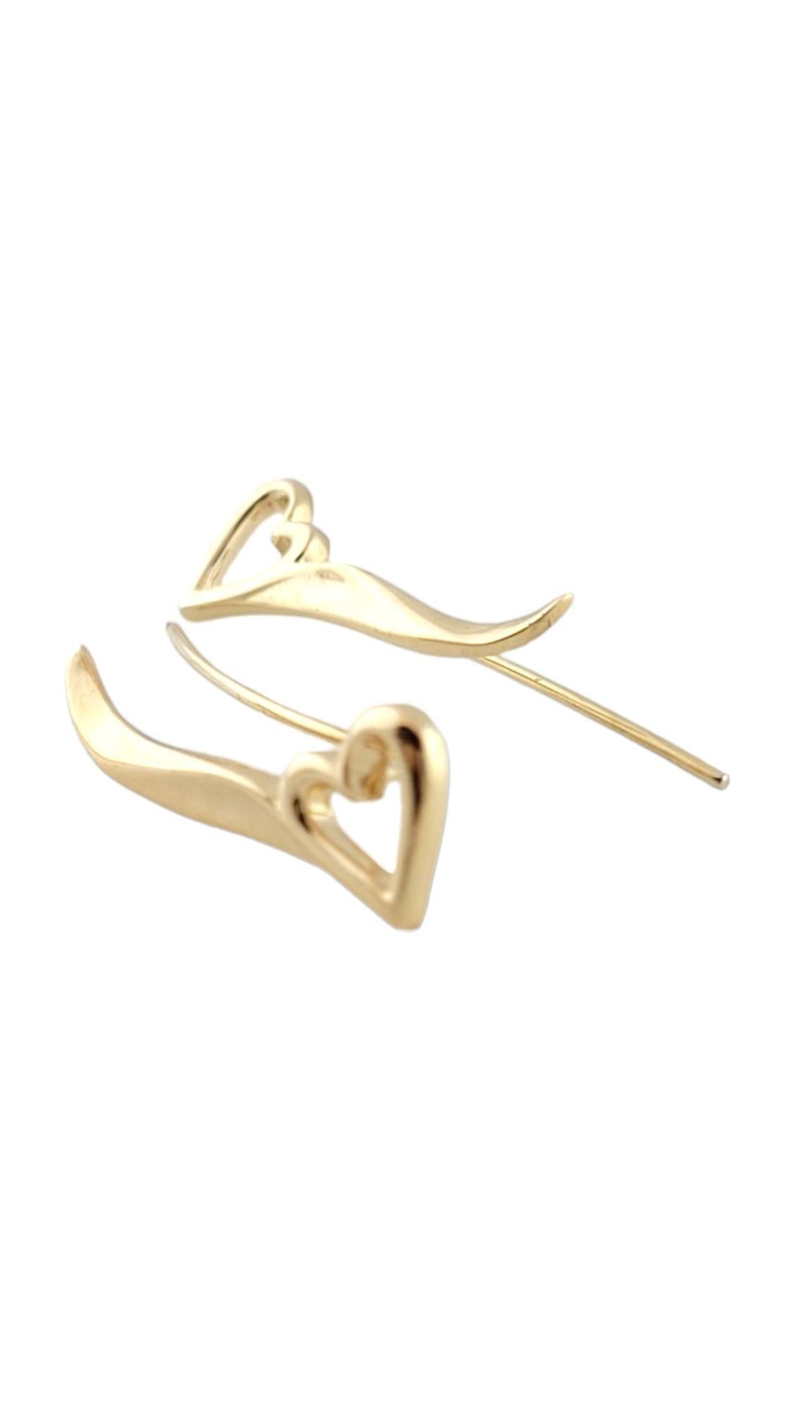 Vintage 14K Yellow Gold Heart Ear Climber Earrings

This gorgeous set of ear climber earrings have a beautiful heart design and are crafted from 14K yellow gold!

Size: 25.21mm X 8.52mm X 1.44mm
		 0.992