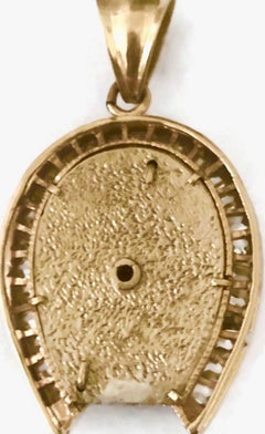 Vintage 14 Karat Yellow Gold Horseshoe Pendant with Baguette Cubic Zirconia