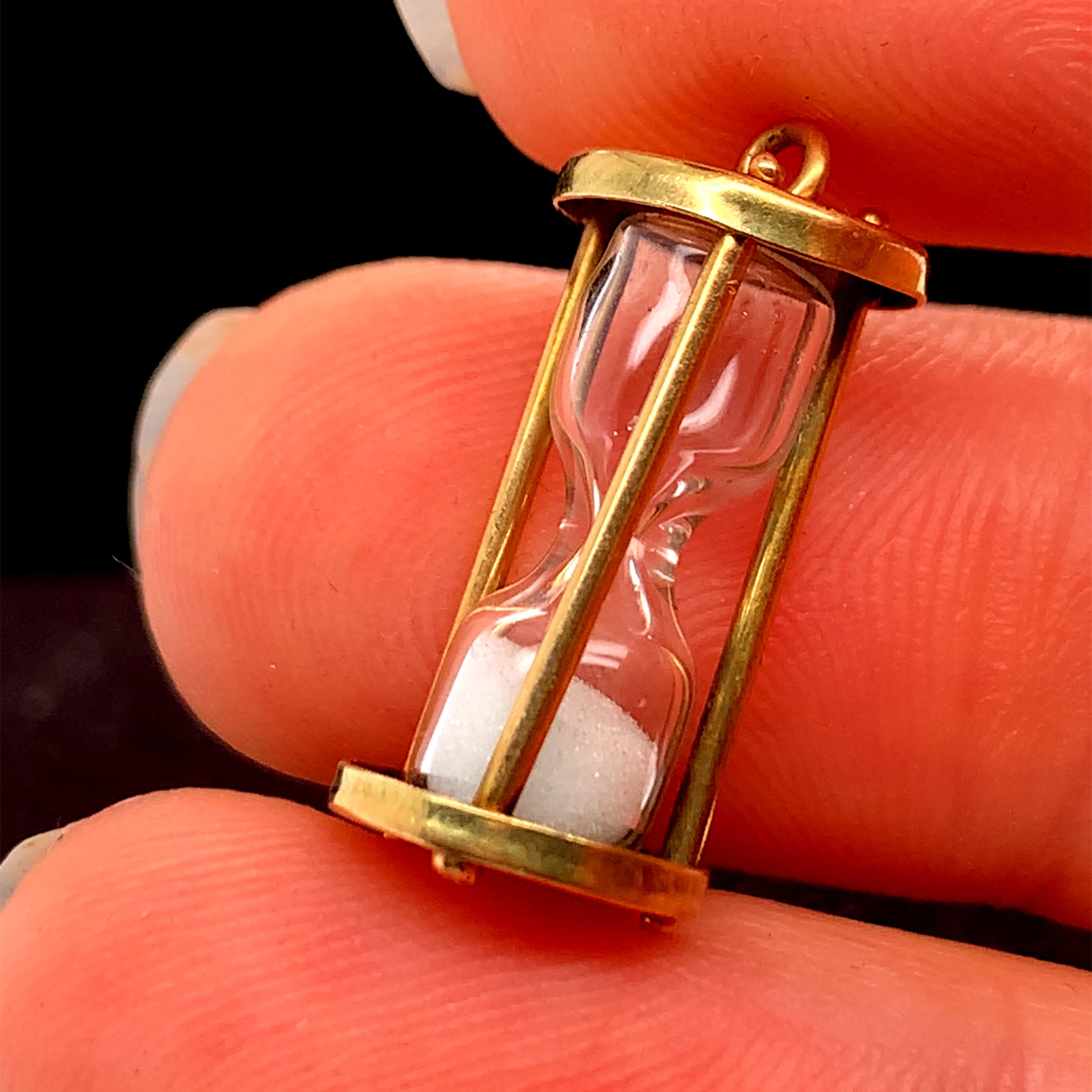 14k gold hourglass pendant